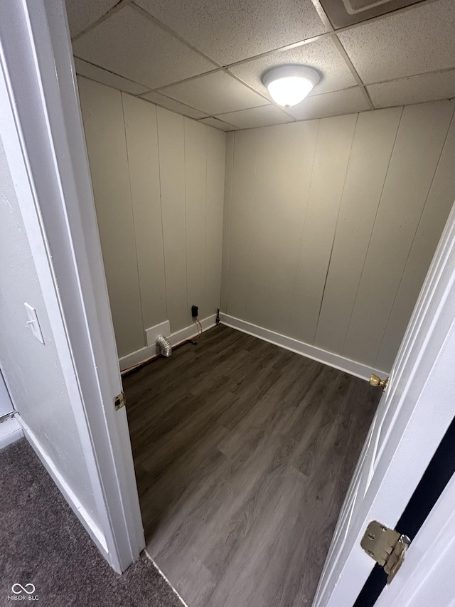 interior space with dark wood-style floors and baseboards