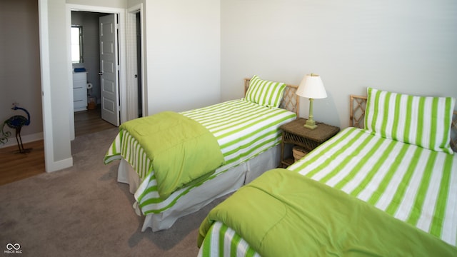 2349 S Copperstone Dr, New Palestine, IN 46163 - carpeted bedroom with washer / dryer and baseboards