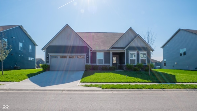 2349 S Copperstone Dr, New Palestine, IN 46163 - craftsman-style home featuring board and batten siding, an attached garage, driveway, and a front lawn