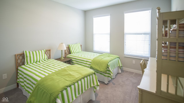 2349 S Copperstone Dr, New Palestine, IN 46163 - bedroom with baseboards, carpet flooring, and multiple windows
