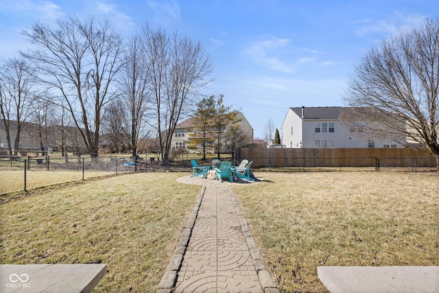 view of yard with a fenced backyard