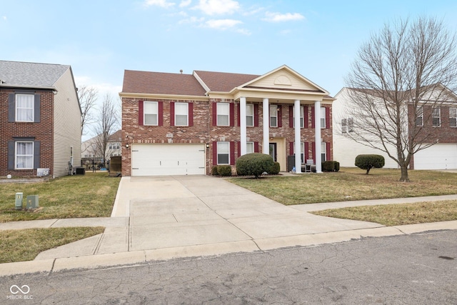 neoclassical home featuring a front yard, roof with shingles, concrete driveway, a garage, and brick siding