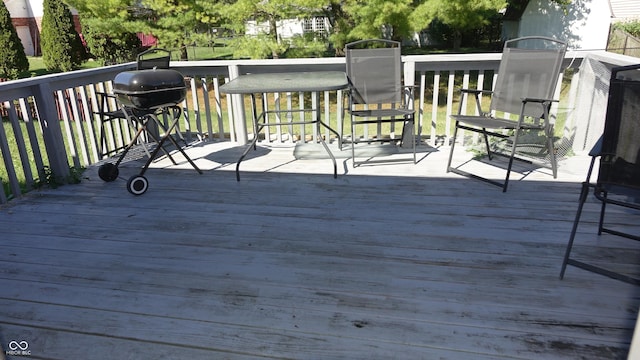 wooden terrace featuring area for grilling