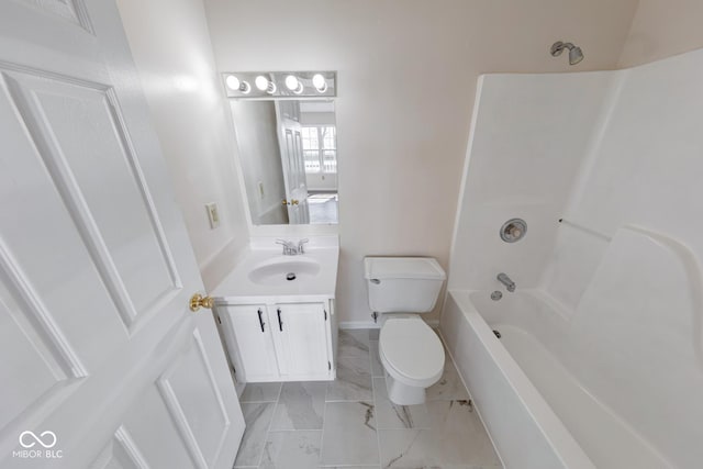 bathroom featuring toilet, marble finish floor, shower / bathing tub combination, and vanity