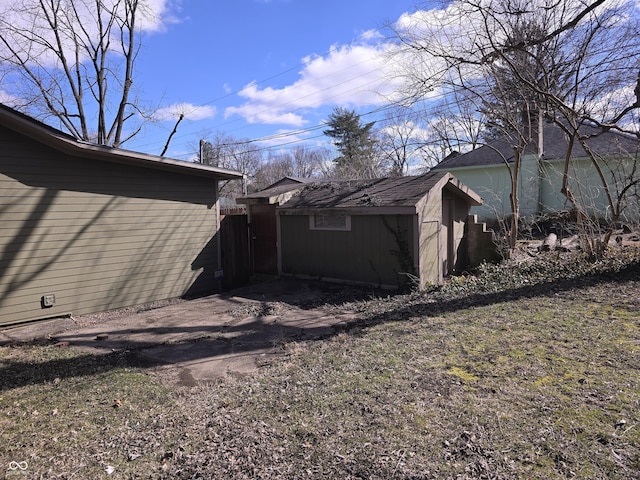 exterior space with a shed