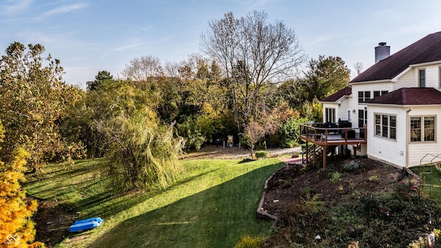 view of yard with a wooden deck