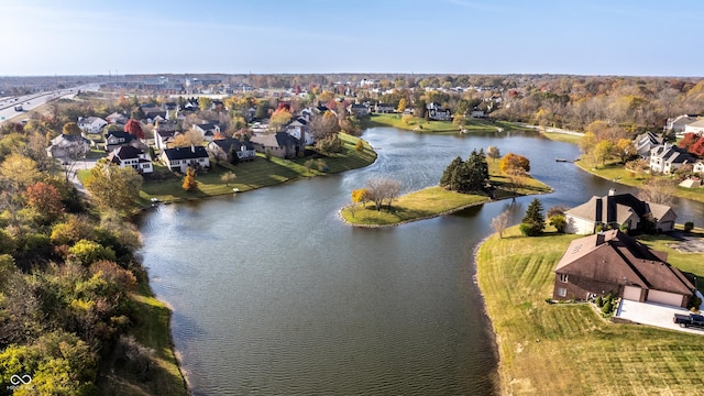 birds eye view of property featuring a residential view and a water view