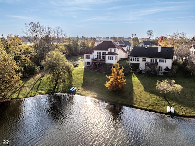 drone / aerial view featuring a water view