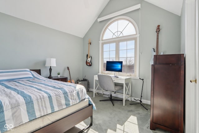 bedroom featuring vaulted ceiling, baseboards, and carpet floors