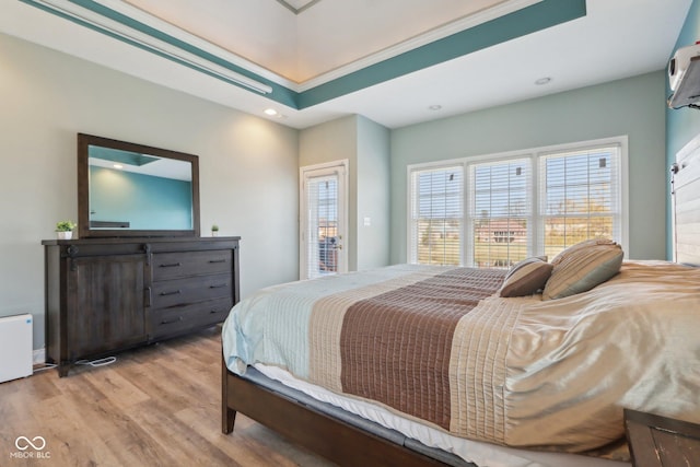 bedroom featuring recessed lighting, baseboards, and wood finished floors