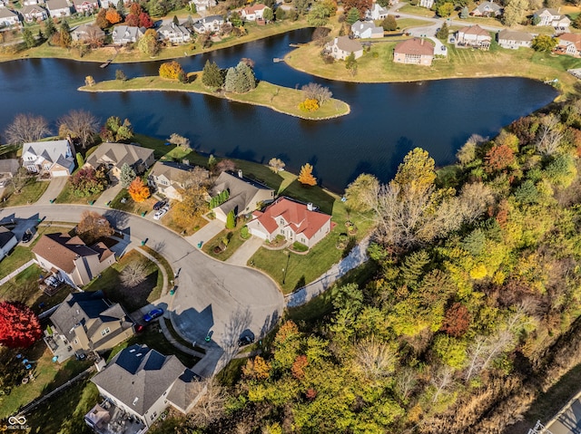 aerial view with a residential view and a water view