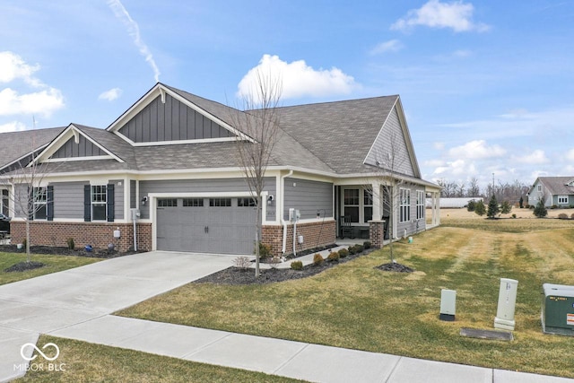 view of front of house featuring brick siding, an attached garage, board and batten siding, a front yard, and driveway