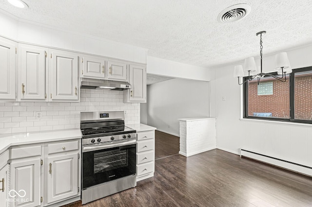 kitchen featuring visible vents, a baseboard heating unit, under cabinet range hood, light countertops, and electric range