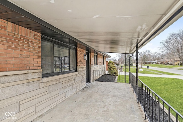 view of patio featuring a porch