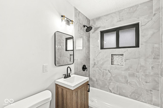 full bathroom featuring a textured ceiling, toilet, vanity, and shower / tub combination