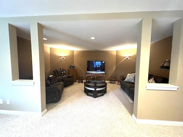 living room featuring carpet, baseboards, and recessed lighting