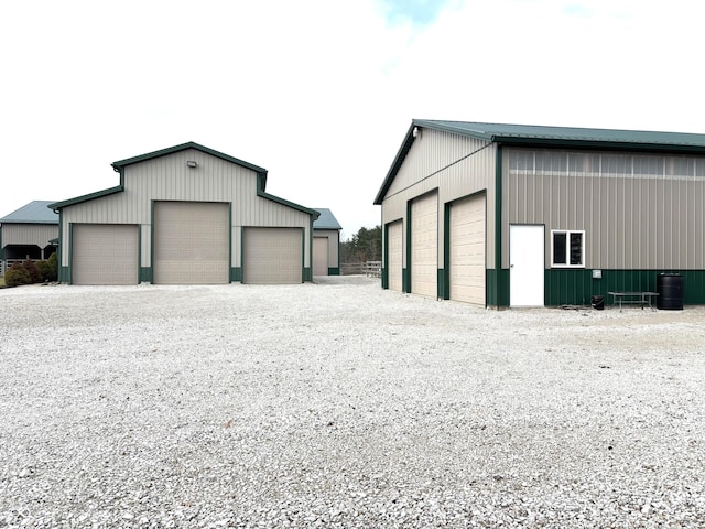 detached garage featuring driveway