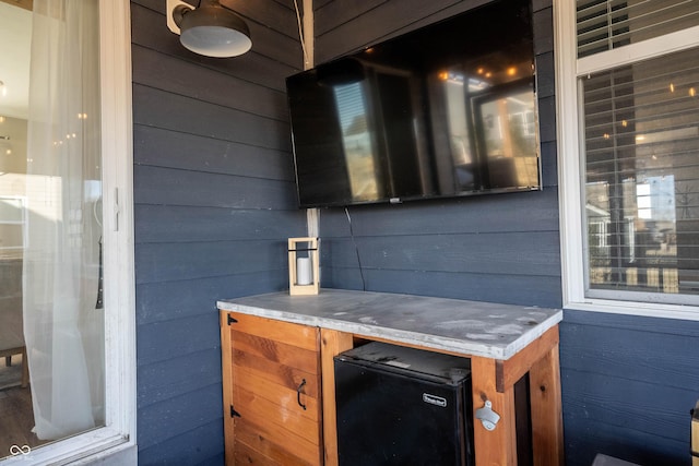 bar featuring refrigerator