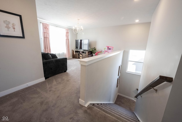 staircase with recessed lighting, carpet, baseboards, and a chandelier