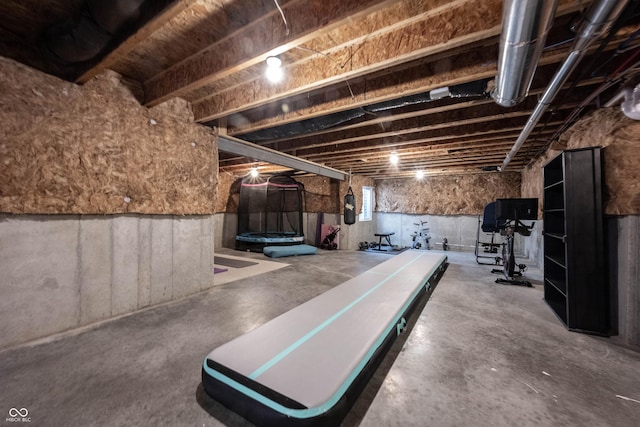 playroom featuring concrete flooring