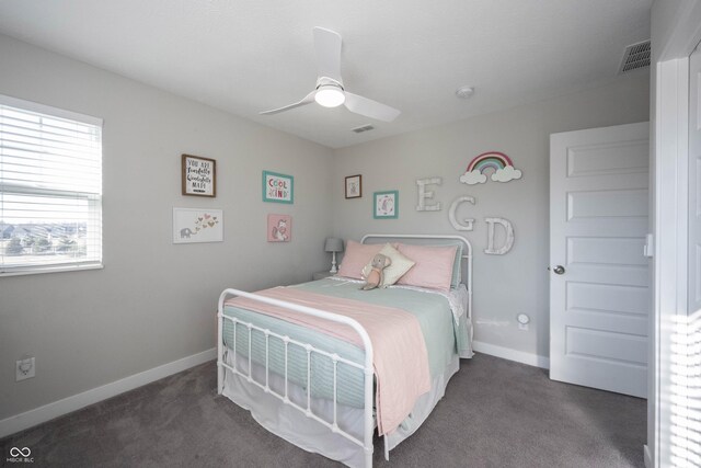 bedroom featuring visible vents, carpet flooring, a ceiling fan, and baseboards