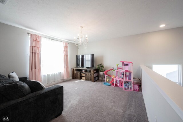 recreation room with recessed lighting, carpet, and an inviting chandelier