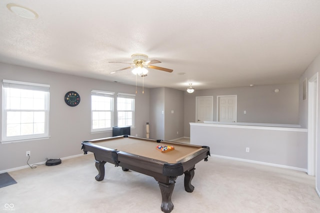 game room featuring baseboards, light colored carpet, ceiling fan, pool table, and a textured ceiling