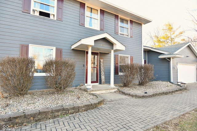 view of front of home featuring a garage