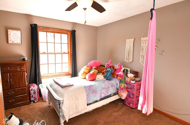 bedroom with ceiling fan and carpet floors