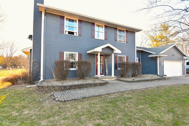 colonial-style house with an attached garage