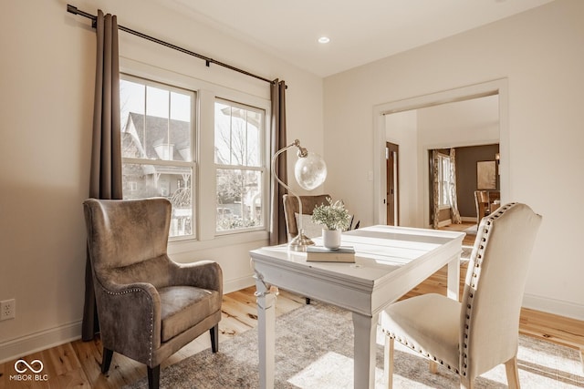 interior space with recessed lighting, light wood-type flooring, and baseboards