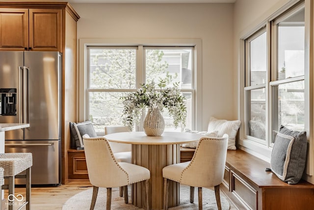 dining area with light wood-type flooring