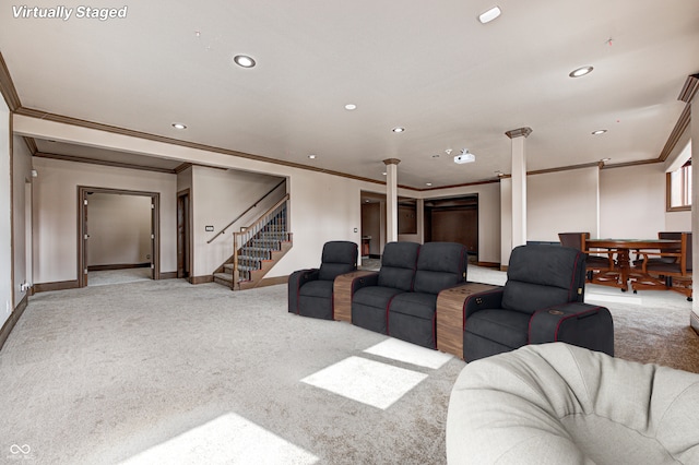 home theater room featuring light carpet, recessed lighting, baseboards, and ornamental molding