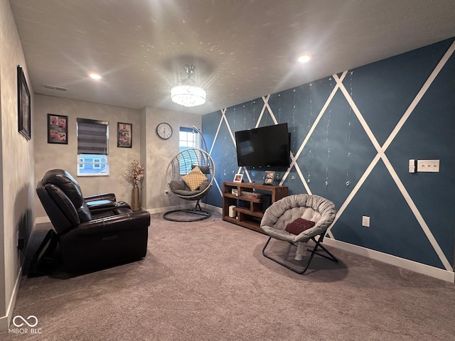 living area with recessed lighting, visible vents, baseboards, and carpet flooring