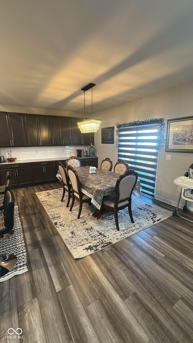 dining area with dark wood finished floors