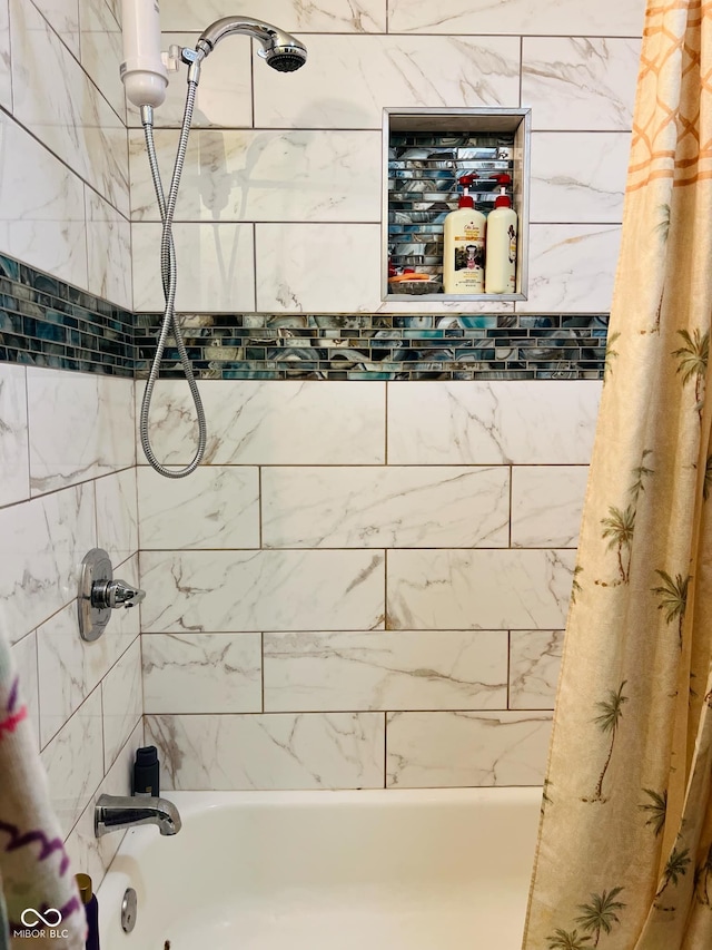 full bathroom with shower / bath combo with shower curtain