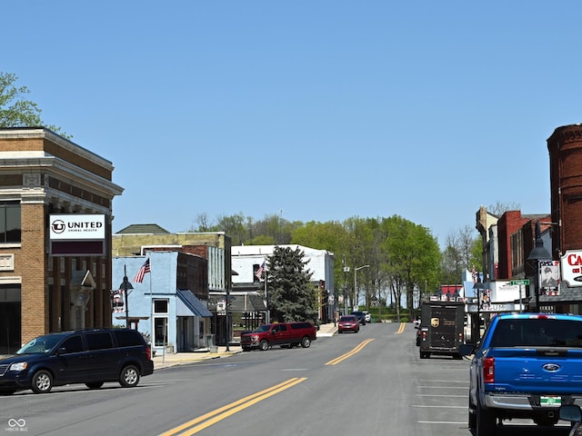 view of road featuring street lights