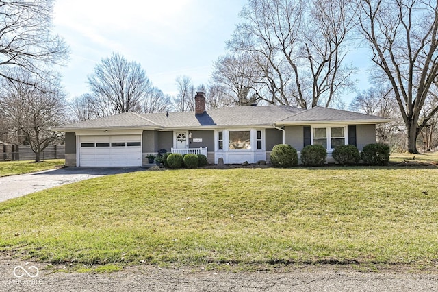 ranch-style house with a garage, a front yard, a chimney, and aphalt driveway