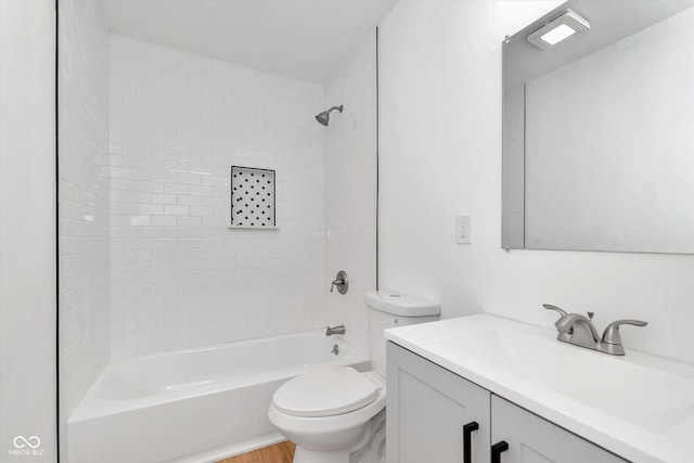 full bathroom with shower / bathing tub combination, vanity, and toilet