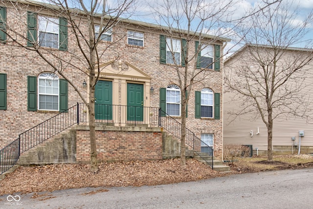 view of front of property with brick siding