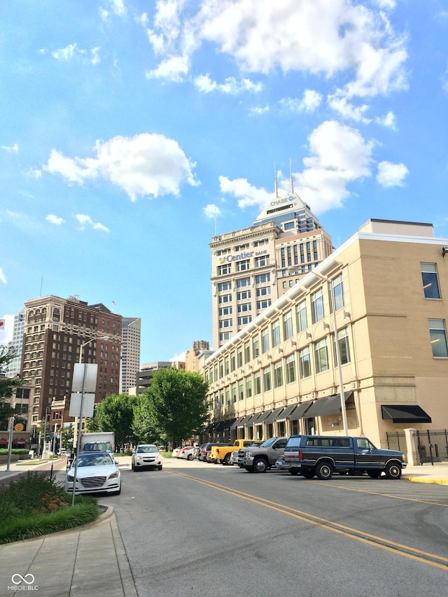 view of building exterior featuring a city view