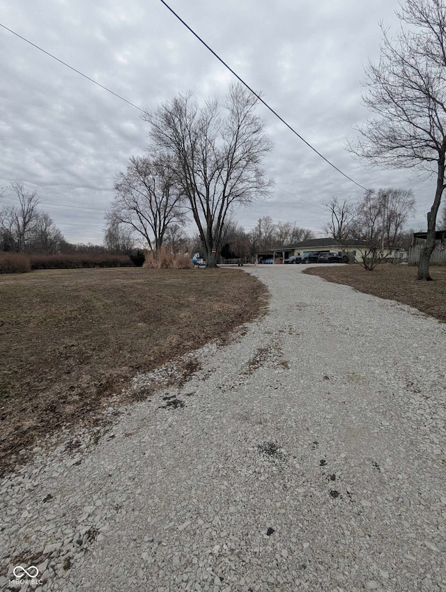 view of road with driveway