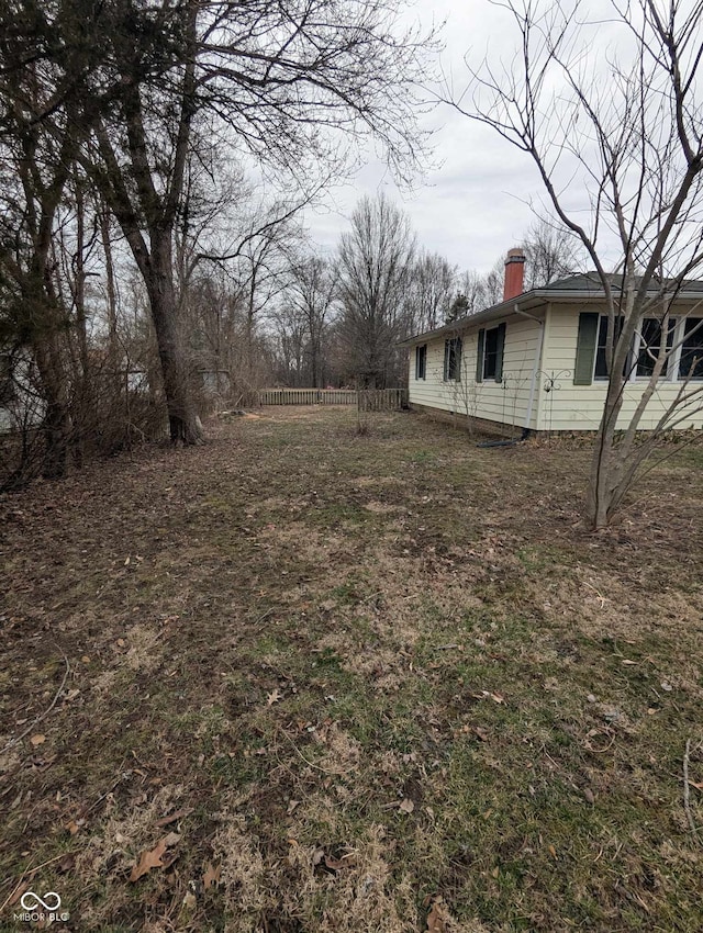 view of yard with fence