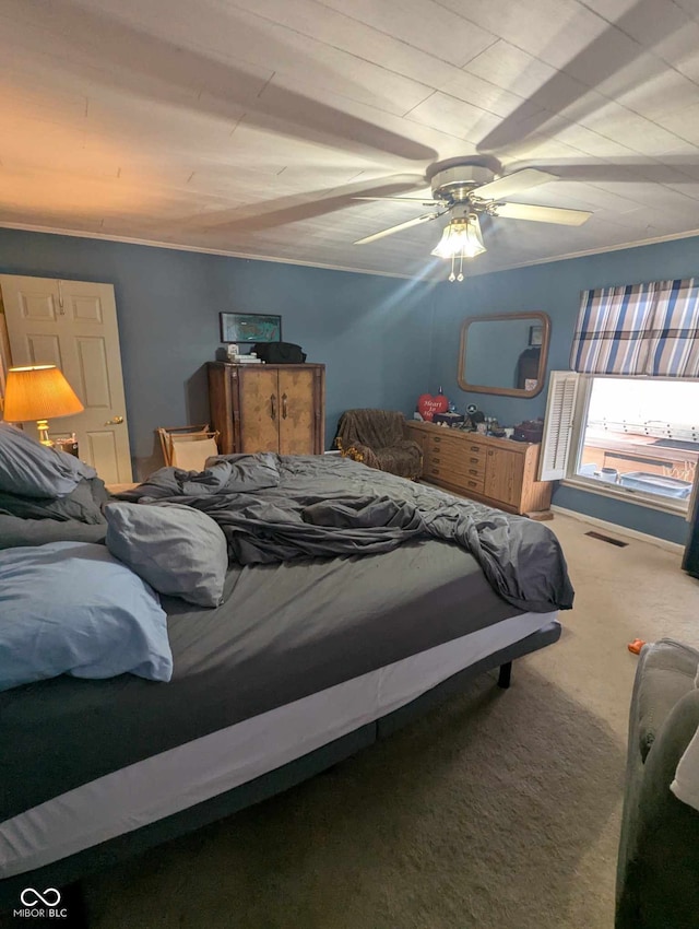 bedroom featuring carpet, visible vents, and ceiling fan