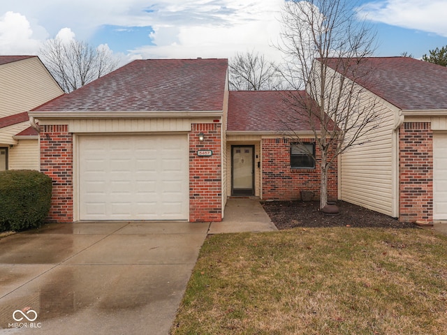 view of front facade featuring brick siding, a shingled roof, a front lawn, concrete driveway, and a garage