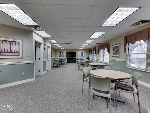 dining room featuring visible vents, baseboards, and carpet