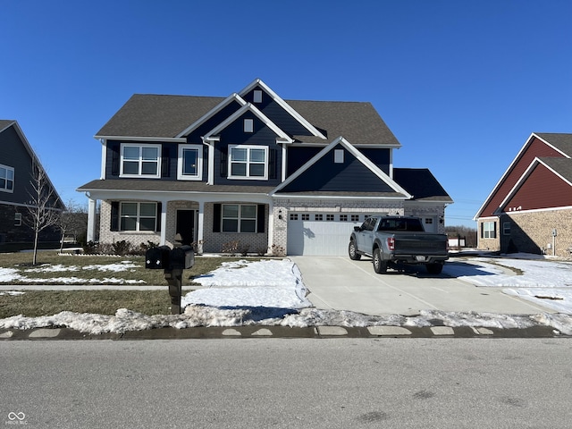 craftsman inspired home with driveway and brick siding