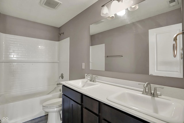 full bath with visible vents, a sink, and toilet