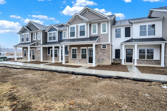 multi unit property with stone siding