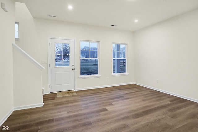 entryway featuring recessed lighting, wood finished floors, and visible vents